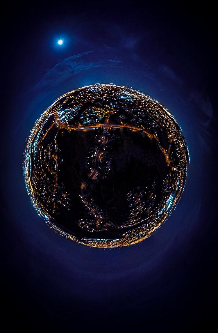 sphere-of-glowing-street-lights-in-night-sky.jpg